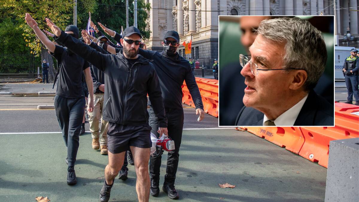 Neo-Nazis in Melbourne earlier this year and, inset, Attorney-General Mark Dreyfus. Picture Getty Images, Elesa Kurtz