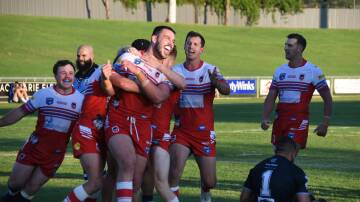 Mudgee celebrate Zac Saddler's second try of the afternoon. Picture by Tom Barber