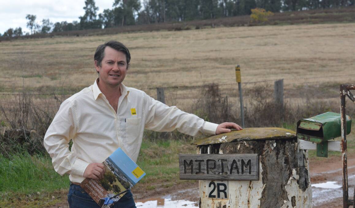 FOR SALE: Ray White Rural's Frank Power outside part of the for sale land. Photo: TOM BARBER