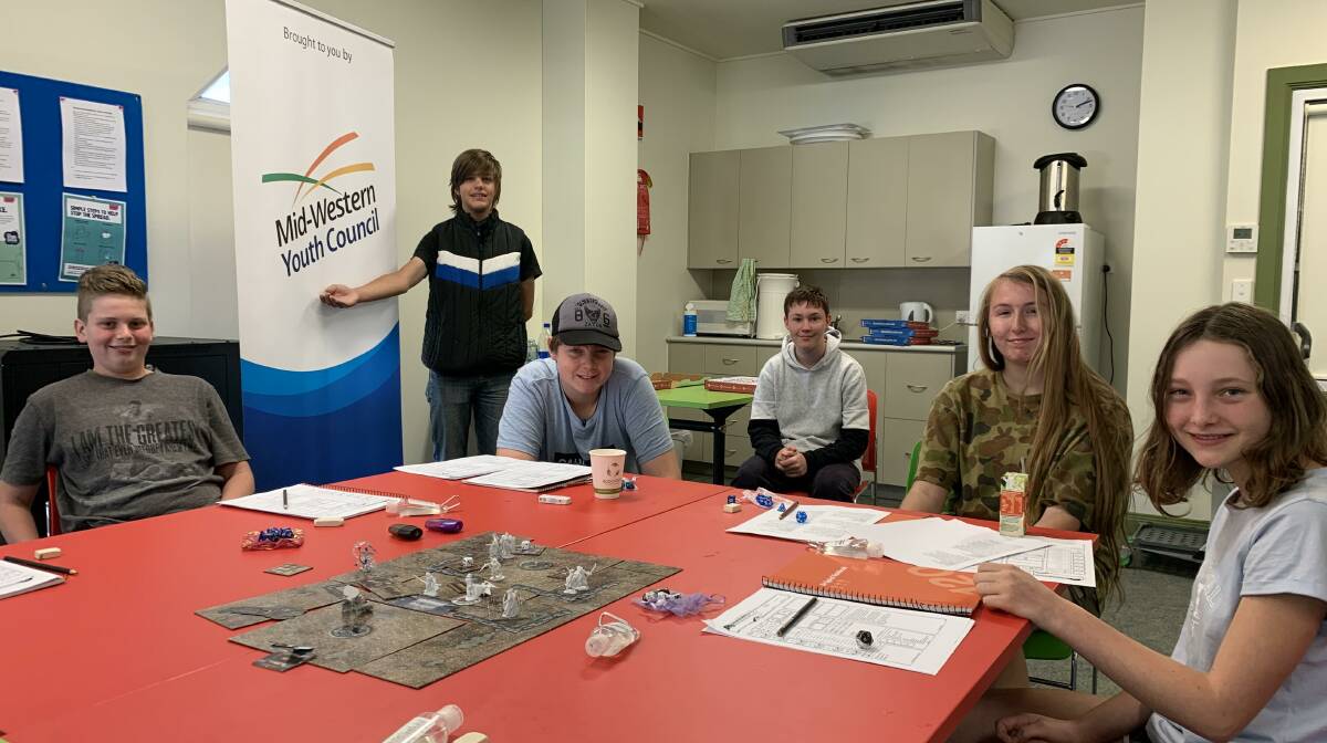 ROLL THE DICE: These young people enjoyed the Dungeons and Dragons Extravaganza at the Mudgee Library. Photo: Nicolas Zoumboulis 