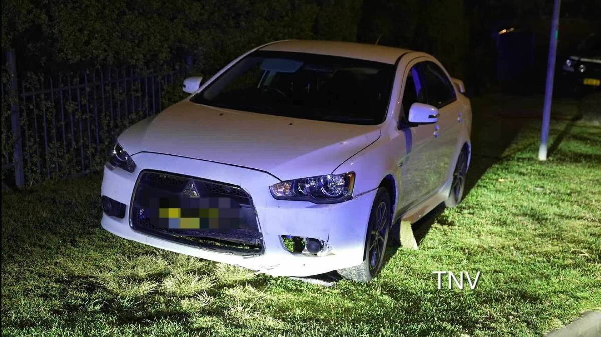 White Lancer allegedly stolen from a home was stopped by police after speeding through the streets of Orange. Picture by TNV.