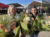 Rowena Petrie and Matilda Lewis, Mudgee had plenty to do as part of the Royal Agricultural Societies' on-ground florist service, preparing presentation bouquets. 