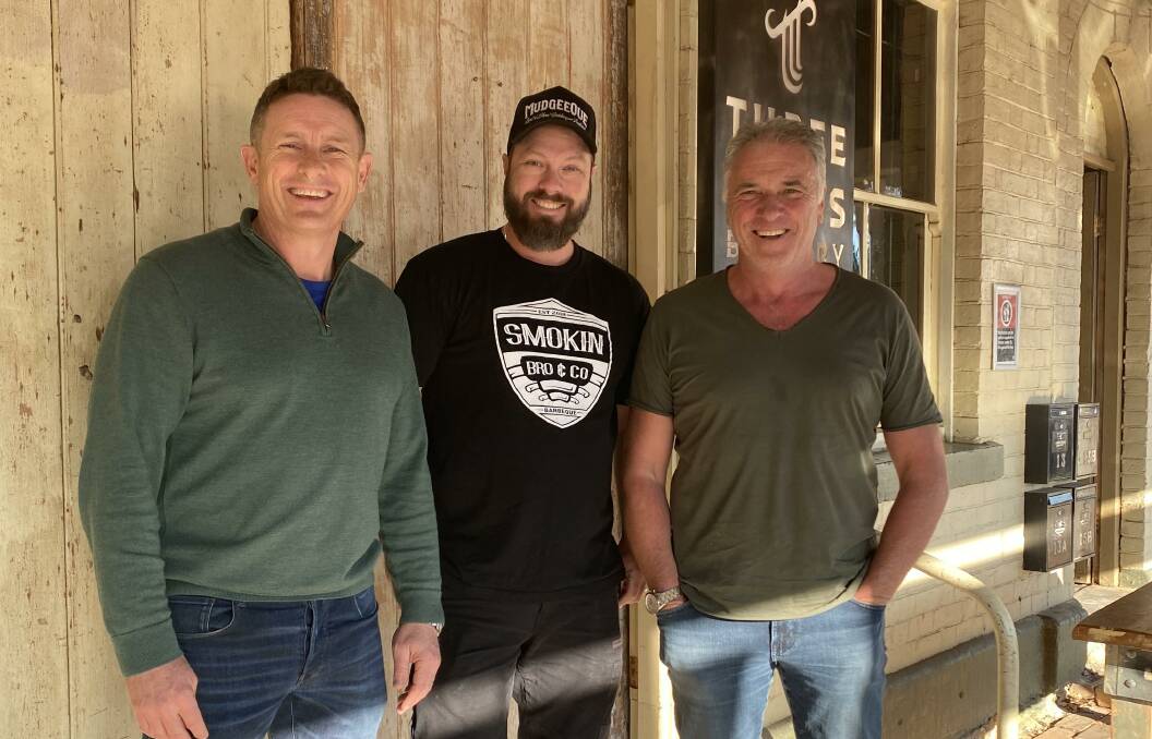 Andrew Palmer [The Property Shop], Brody Crawford [Smokin Bro &
Co] & Mick Ash [Three Tails Brewery]. Picture supplied. 