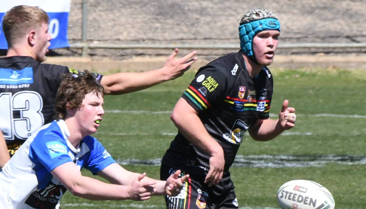 LOOMING: Bathurst Panthers' Lachie Large (in headgear) will start at prop for the Western Rams. Photo: CHRIS SEABROOK