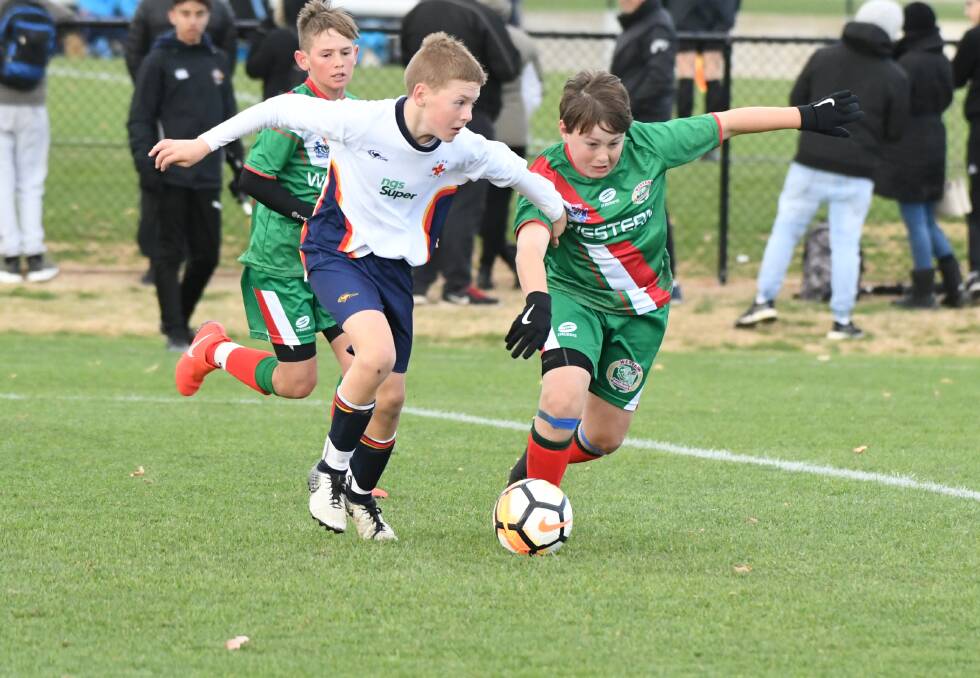 ON THE BALL: Bathurst Primary School student Hugh Thomas featured in the Western team in the second day of the NSW PSSA Football Carnival. Photo:CHRIS SEABROOK 052919cpssa1