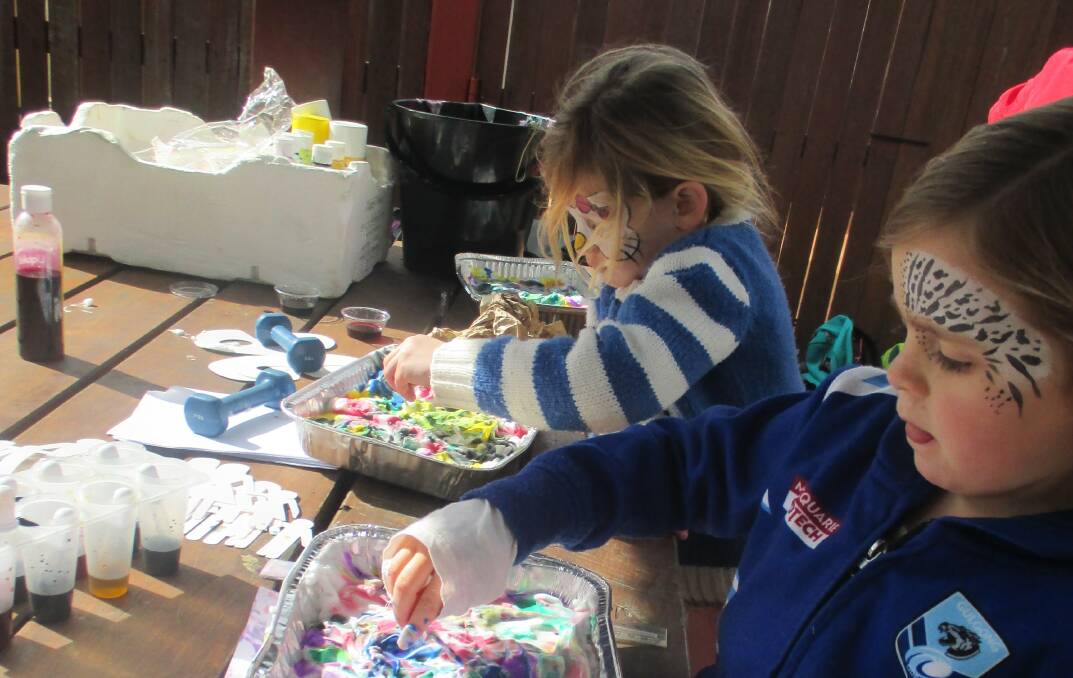 Crafty: Children try marbling with Marian Imrie. Something to do or try for every age.