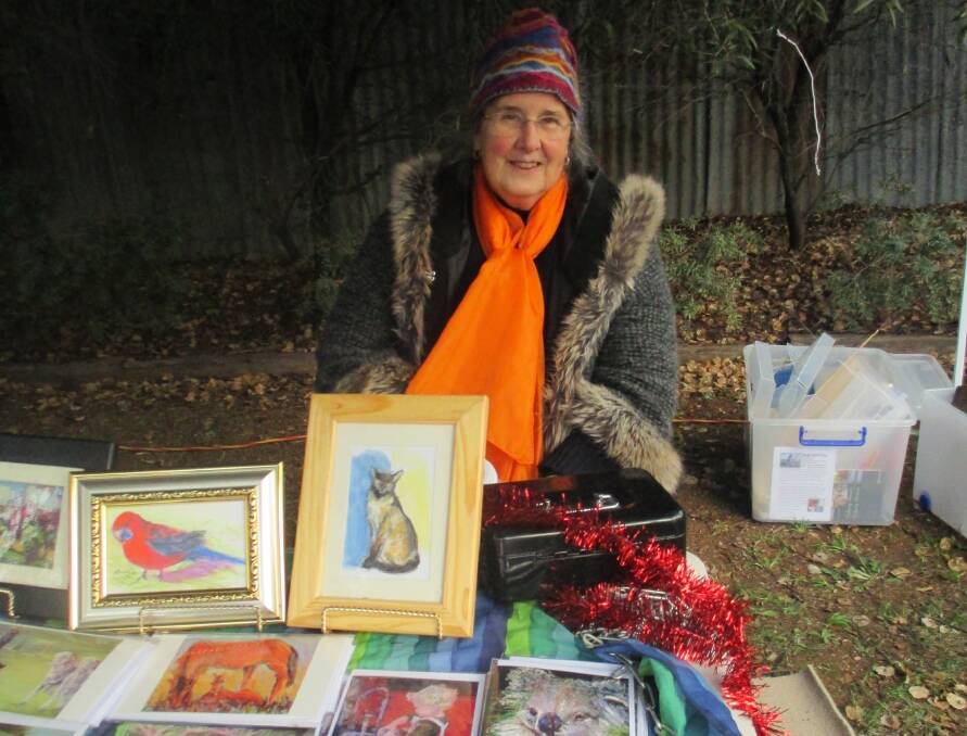 Creative: Merilyn Burch Carney with a range of artwork. Markets organiser Agnes Nordmann thanks those who make the markets possible.