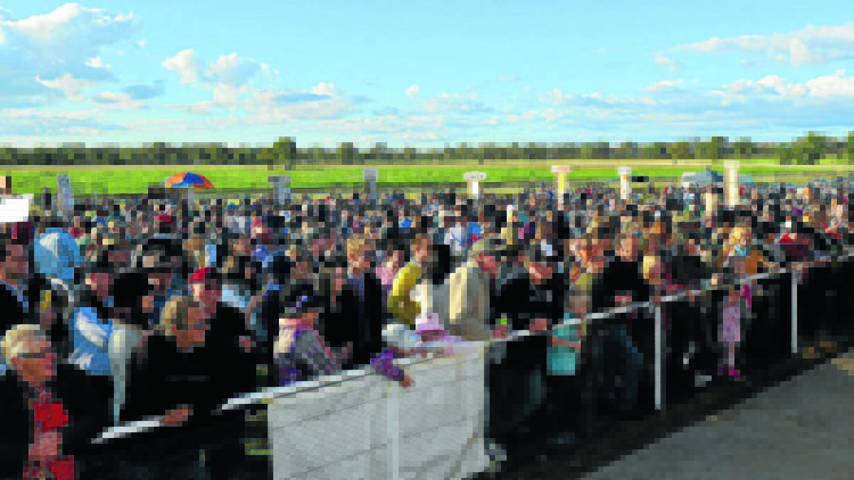 Gathered for Fun: The Gulgong Turf Club draws a crowd of thousands to its annual race day.