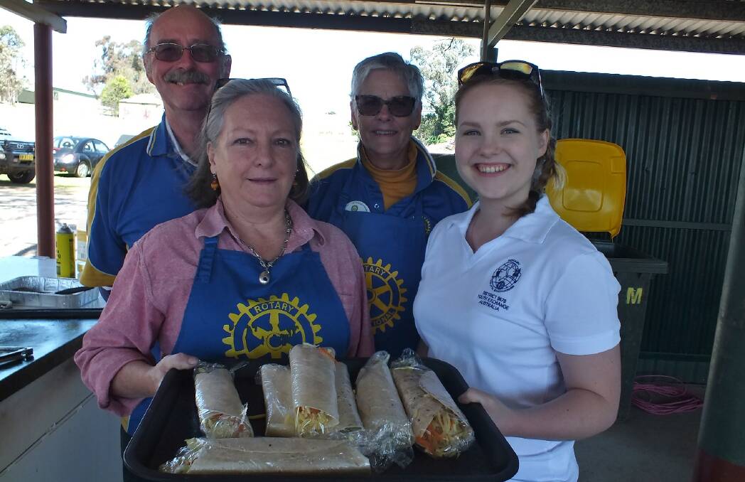 Rotarians Serving: Rylstone family Fun Day, Klaus Keck, Elizabeth McKay and front row, Mandy Barker with Sophie McCormick from the USA.
