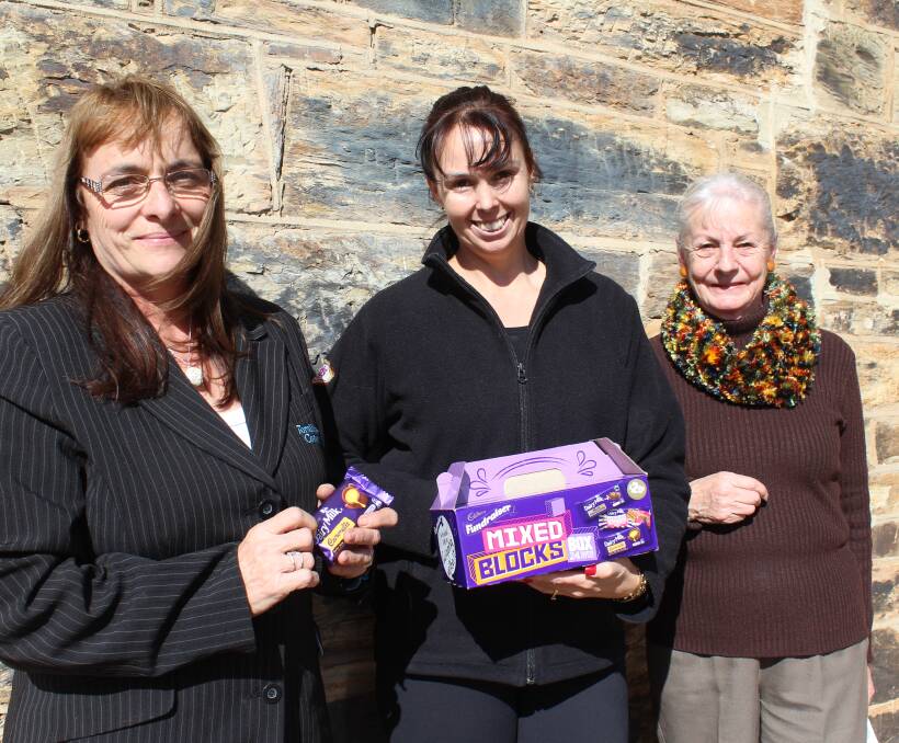 Sweet Cause: Renee (centre), Christine and Marie from Gulgong Netball Club.