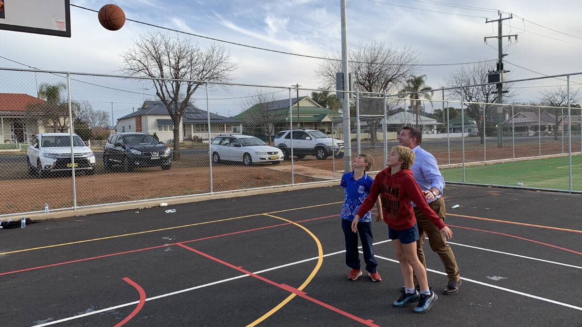Active Kids: Member for the Dubbo electorate with Charlie Kiss and Lachlan Morley at the opening of the newly developed basketball courts at Rygate Park, Wellington.