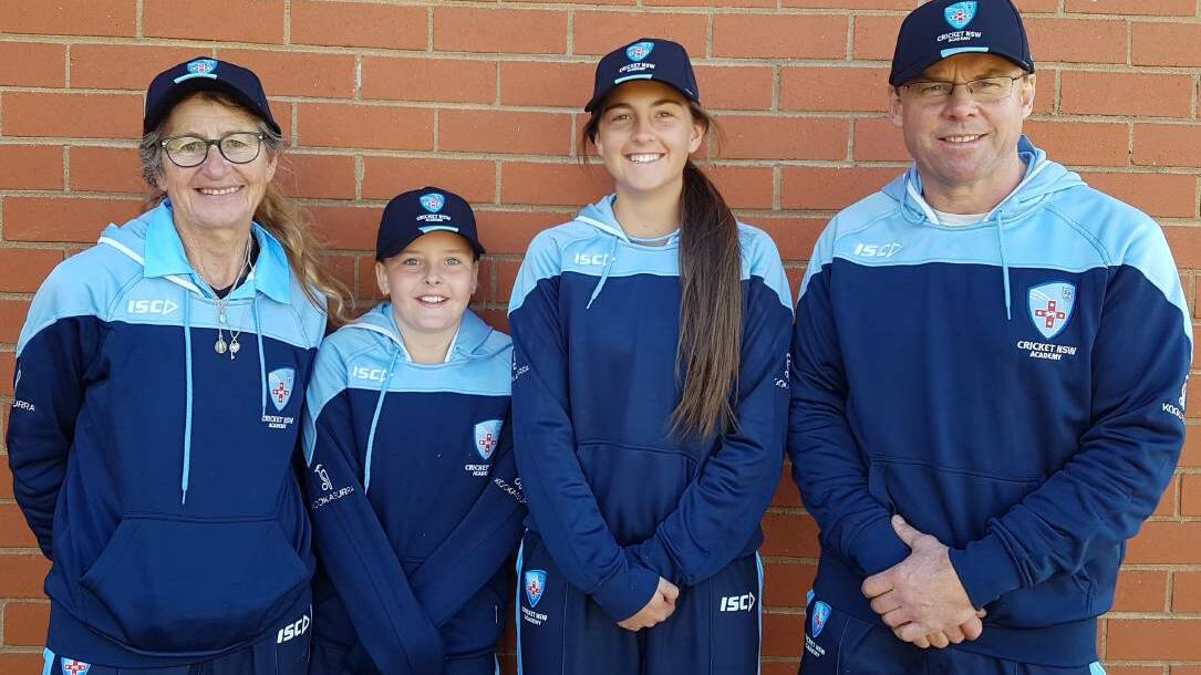 Carolyn Sheehan (left) and Andy Litchfield offered their guidance to Parkes cricketers Maddy Spence and Miki Dunn in 2017. 