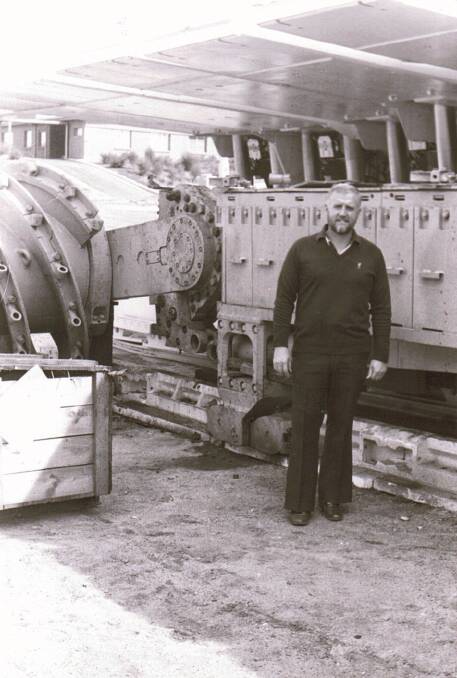 FLASHBACK: Eddie Morgan towards start of his career in front of the mining machinery. 