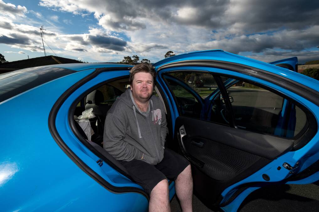 Stuart Mansfield is living in his car after he and his son were evicted from their St Leonards home last week due to the end of a rental scheme on their privately-owned rental. Picture: Phillip Biggs