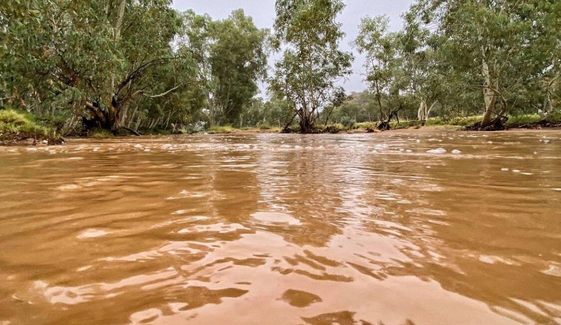 The normally dust dry Todd River in central Australia is in flood.