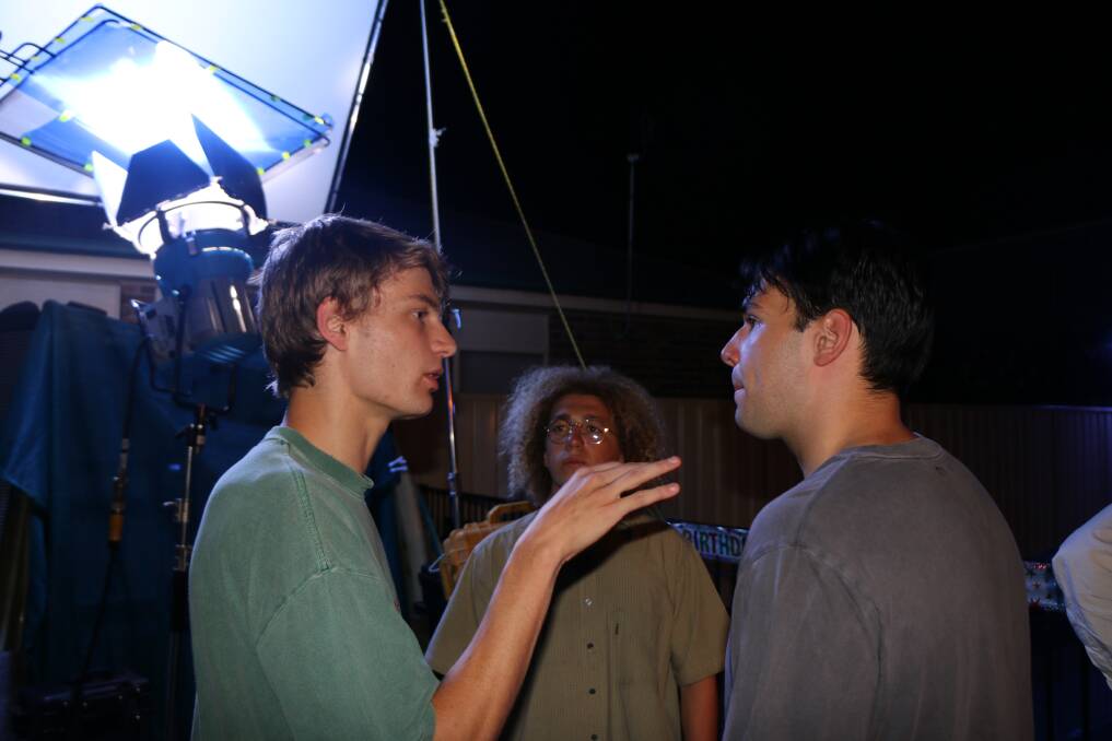 Cameron Utiger (left) during filming. 
