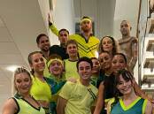 Oliver Sievers from Coolah (middle left wearing yellow singlet with blonde hair) with the Australian team who performed at the 2022 Commonwealth Games closing ceremony. Picture: Supplied
