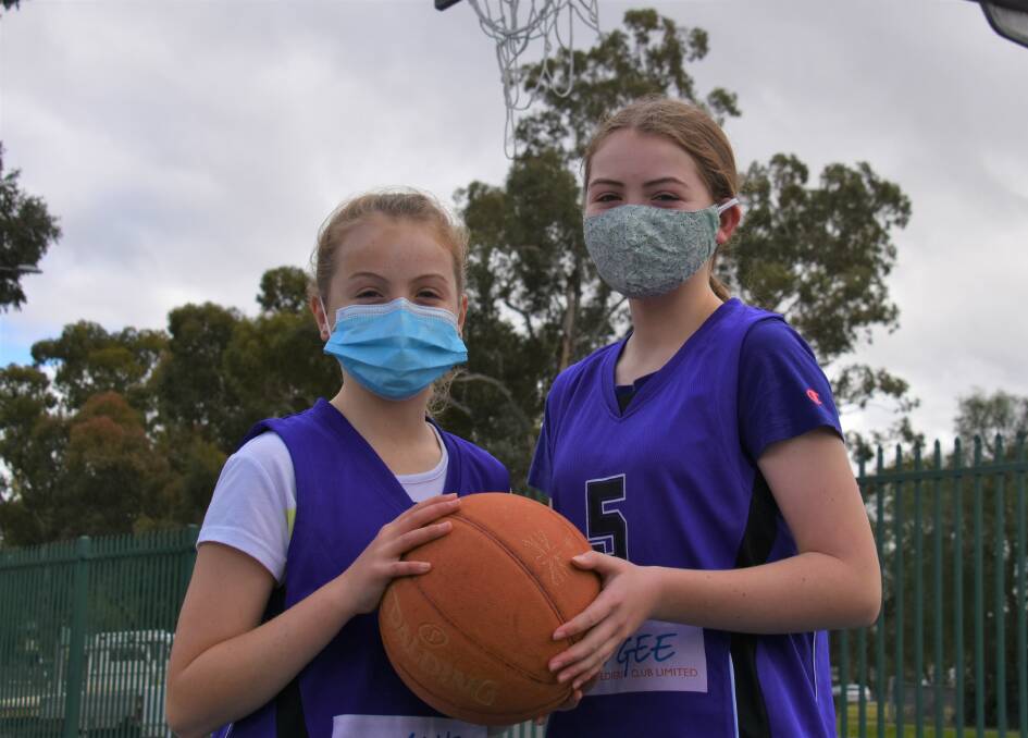 BASKETBALL TIME: Mudgee's Piper and Cameron Etherington are a pair of the many girls across the Mid-Western region who love to play basketball. Photo: Jay-Anna Mobbs