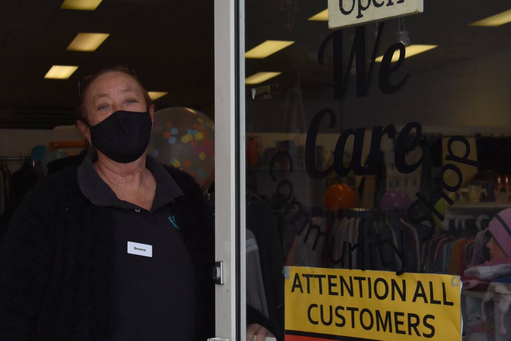 We Care Community Shop manager, Donna Collins at the store's entrance. Picture: Jay-Anna Mobbs