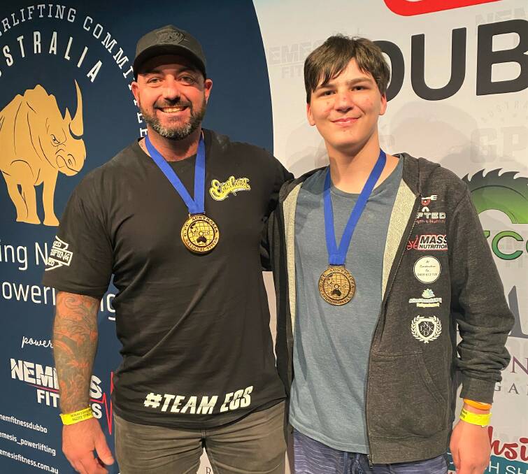 Mudgee powerlifters Dylan McDonald and Cooper Hinton with their medals at the Global Powerlifting Committee Spring Nationals in Dubbo. Picture: Supplied
