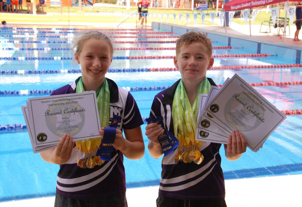 SUPER SWIMMERS: Charlotte Wilson and Nate Atkinson broke handful of 40-year-old records at recent Western Area Championship Carnival. Photo: Michelle Wilson