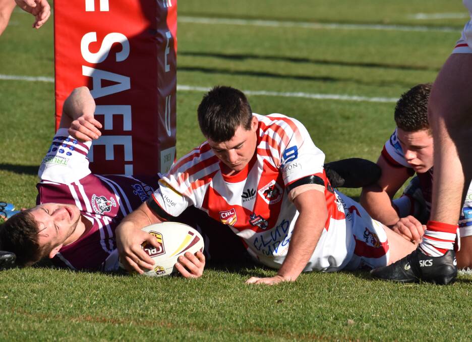 POINTS: Mudgee's Ben Thompson earns himself a try after breaking through Blayney's defence. Picture: JAY-ANNA MOBBS