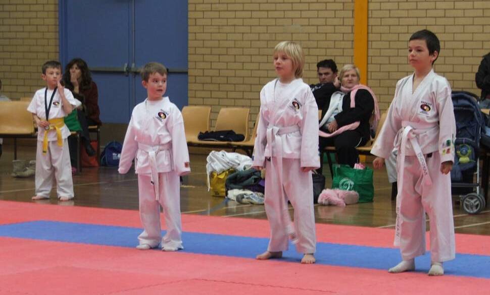 TRAINED: Logan Birchall (right) on the mats during his earlier years at Mudgee Martial Arts. Picture: SUPPLIED
