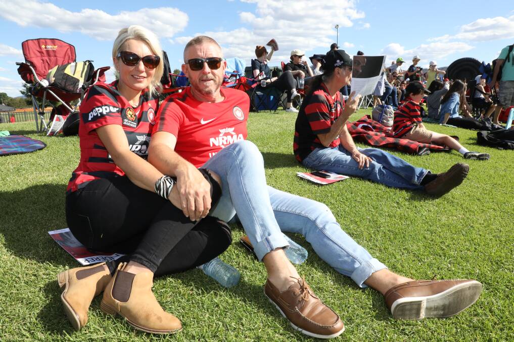 ULTIMATE FANS: Leigh and Kylie have been a part of the Wanderers tribe ever since the club came about. Photo: Simone Kurtz