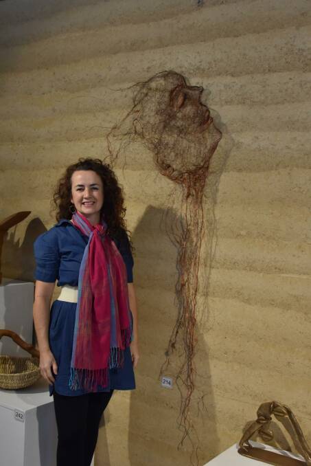 ARTWORK: Felicity Cavanough with her sculpture, 'Roots'. Picture: JAY-ANNA MOBBS