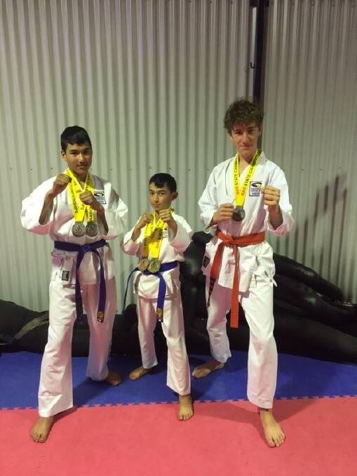 FIGHT: William, Alan and Jack head to nationals after proving too strong at state comp. Photo: Supplied