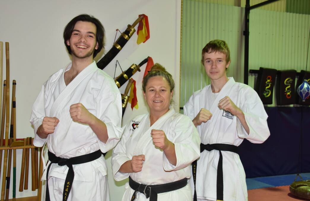 BLACK BELTS: After years of dedication, Logan Birchall, Jacqueline Spice and Nicholas Hopson were awarded with black belts on July 10 at Mudgee Martial Arts. Photo: Jay-Anna Mobbs