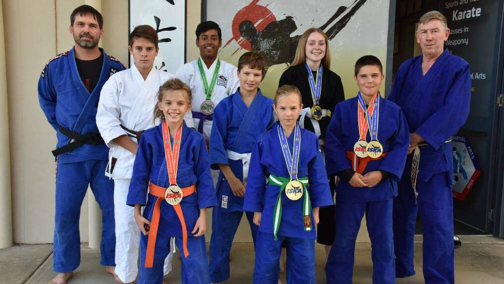 DOORS OPEN: Earlier this year, Mudgee Martial Arts students competed at the ISKA Western NSW Open under Shane Rattenbury and Geoff Spice's (right) guidance. Photo: Jay-Anna Mobbs