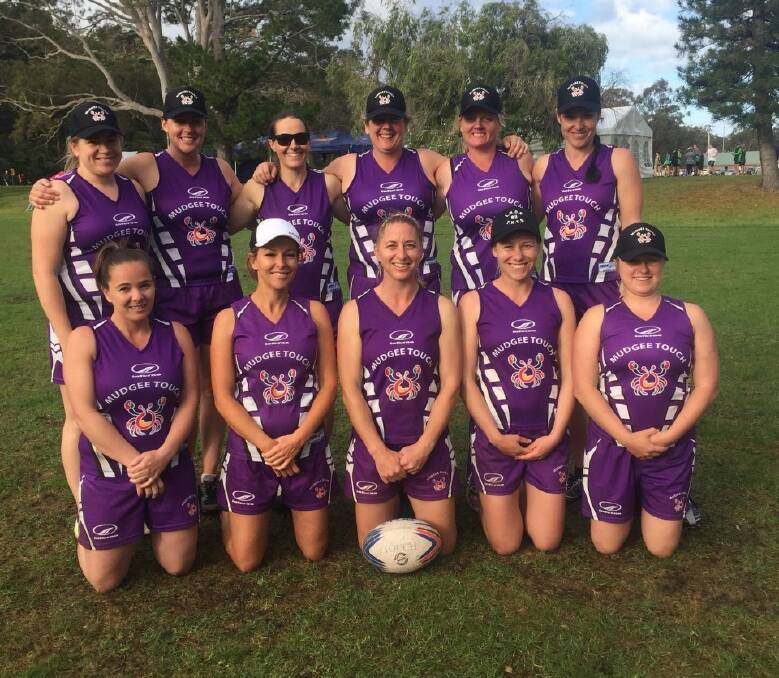MUDCRABS: Back row L-R: Jes Cubis, Erin Perini, Sandie Hudson, Nikki O’Brien, Shannon Comer, Sara Perry.
Front row L-R: Melissa Battersby, Haley Roberts, Kerry Reynolds, Michelle Carter, Alanah Rankin. Photo: Supplied