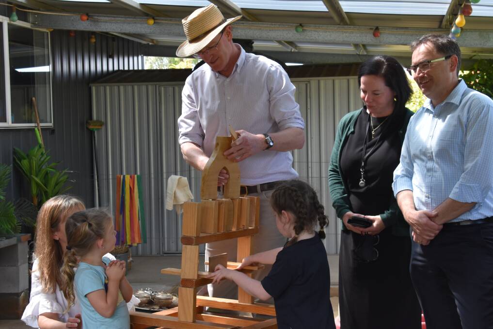 PROMISE OF TOMORROW: Federal Member for Calare and Minister for Veterans' Affairs and Defence Personnel, Andrew Gee with Mid-Western Day Care children and council staff. Picture: JAY-ANNA MOBBS