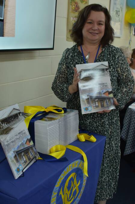 Mudgee CWA day branch member, Sonja Lunn with copies of her 'Mudgee CWA branch celebrating 100 years' book at the 100th anniversary celebration. Picture: Jay-Anna Mobbs