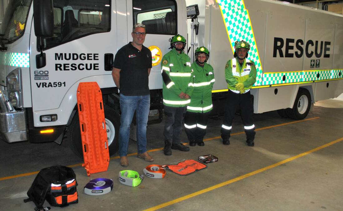 Mathew Croake (Moolarben Coal) and some of the Mudgee Rescue Squad team who are pleased with their new safety equipment. Picture: Supplied