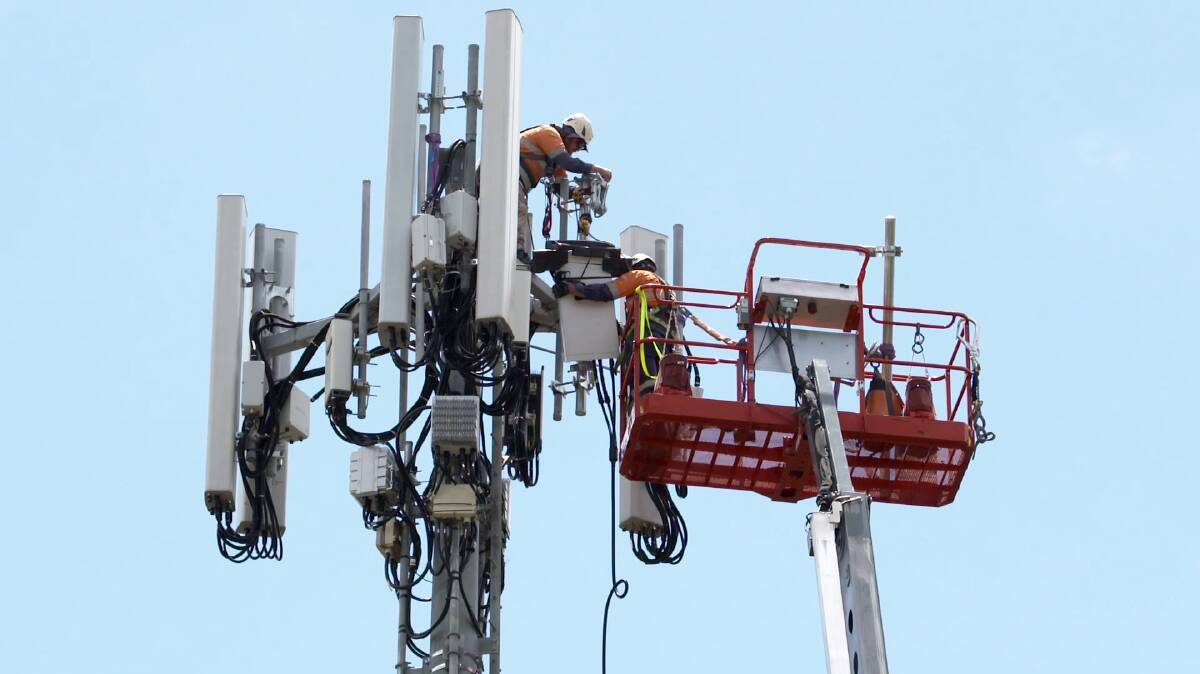 IT HAS ARRIVED: 5G antennas being installed at a local base station. Photo: Supplied