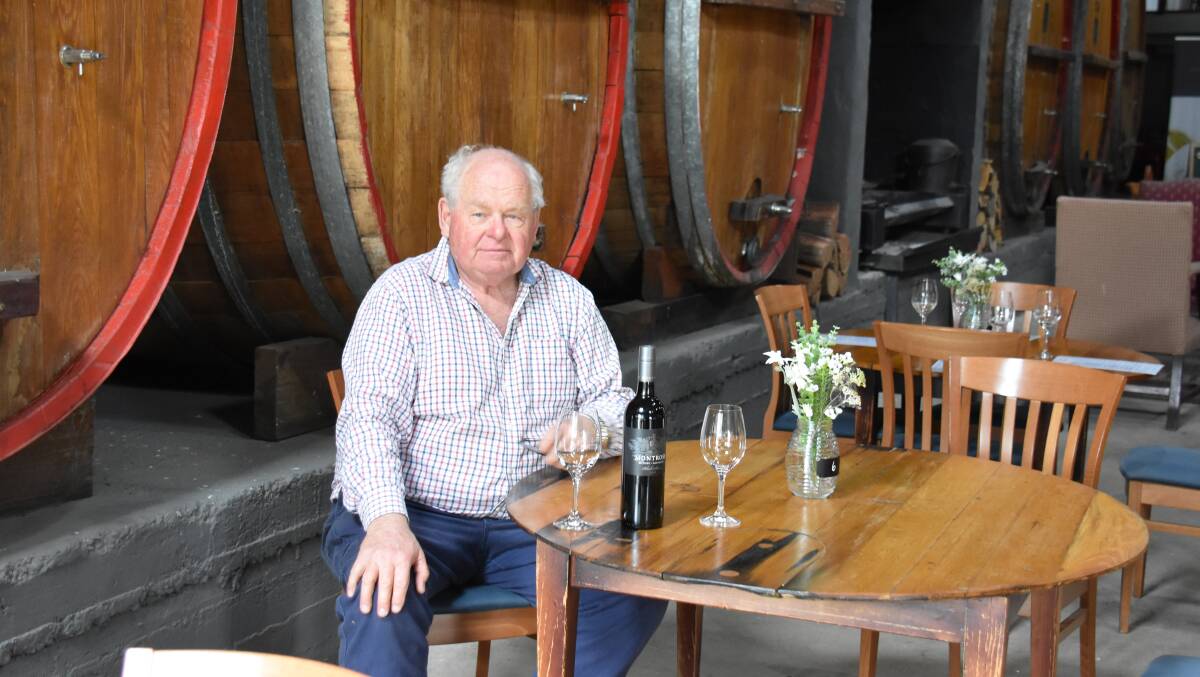  CLASS OF THEIR OWN: Craigmoor and Montrose ambassador Pat Auld with a bottle of the trophy winning Mudgee Montrose Black Shiraz 2018. Photo: Jay-Anna Mobbs