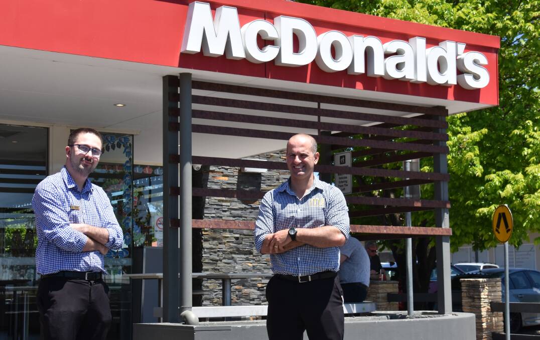 CHANGE: McDonald's Mudgee assistant manager, Matthew Winter with McDonald's Mudgee licensee, Daniel Zammit. Picture: JAY-ANNA MOBBS