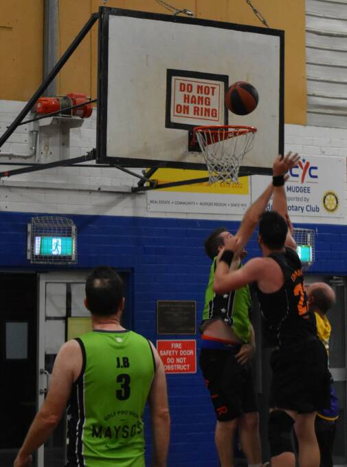 DEFEAT: Peter Mayson attempting to block the shot from Ben Edmunds. Photo: Supplied
