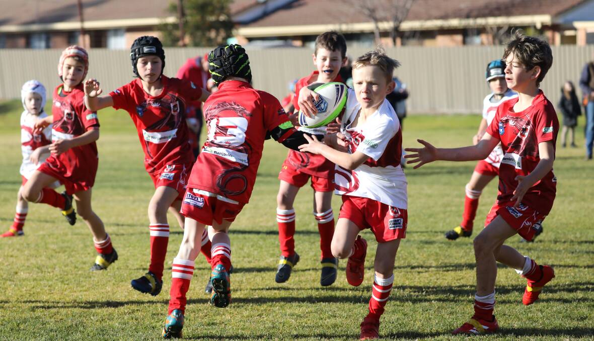ON THE RUN: Ryder McPhee breaks through the defence in one of his 2020 performances for the junior Mudgee Dragons. Photo: Simone Kurtz