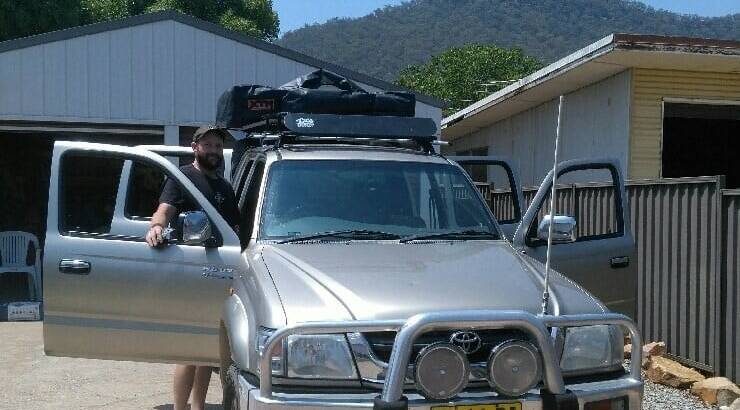 SEARCH: Isaac Thomas pictured with a vehicle he may be travelling in while unaccounted for. Picture: SUPPLIED