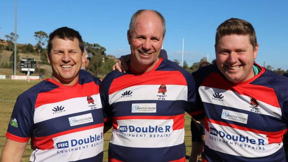 VICTORY: The Mudgee Wombats second grade, including Greg Ward, Brett Swords (c) and John Carters, were awarded the New Holland Cup title. Photo: Ross Smith