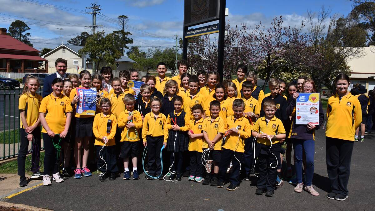 HEART: Mudgee Public School students celebrating their impressive fundraising total. Photo: Jay-Anna Mobbs