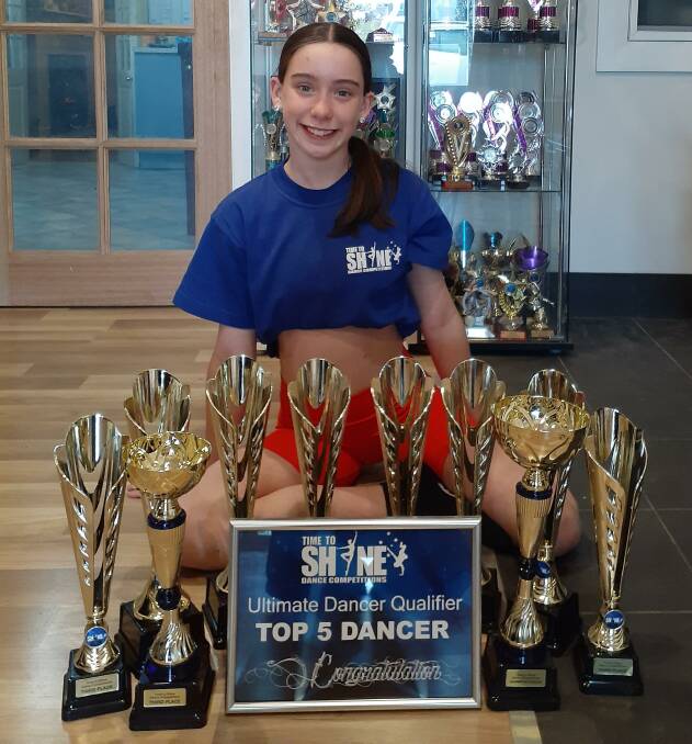 SOMETHING TO BE PROUD OF: Abbey had nothing but sheer excitement once her 'huge' box of trophies arrived in the mail. Photo: Supplied