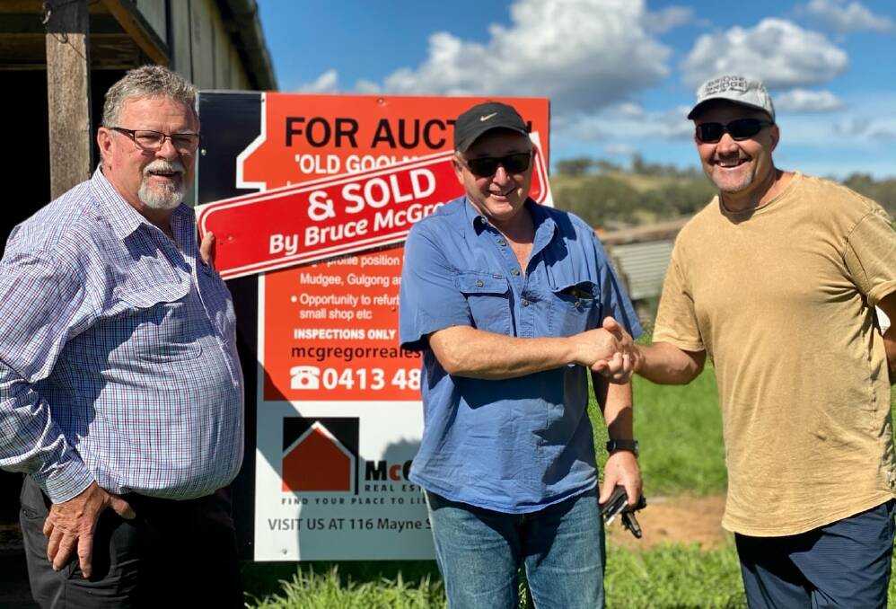 SOLD: McGregor Real Estate director, Bruce McGregor with two clients marking the sale of the Goolma Bakery building. Picture: MCGREGOR REAL ESTATE