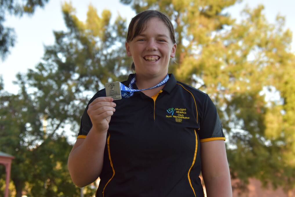 YOU GO GIRL: After receiving a silver medal in shot put at the NSW State Youth Championships, Mollie Blackman hopes to one day represent Australia. Photo: Jay-Anna Mobbs
