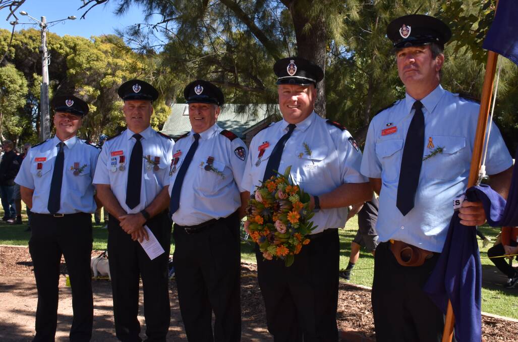 HONOUR: Mudgee Fire Brigade members prepare to lay a wreath at the 2021 Anzac Day main service. Picture: NIC ZOUMBOULIS