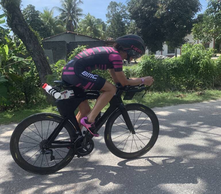 TRIATHLETE: Shannon Chapman in the cycling leg of Ironman Malaysia, where she came in sixth place. Photo: Supplied