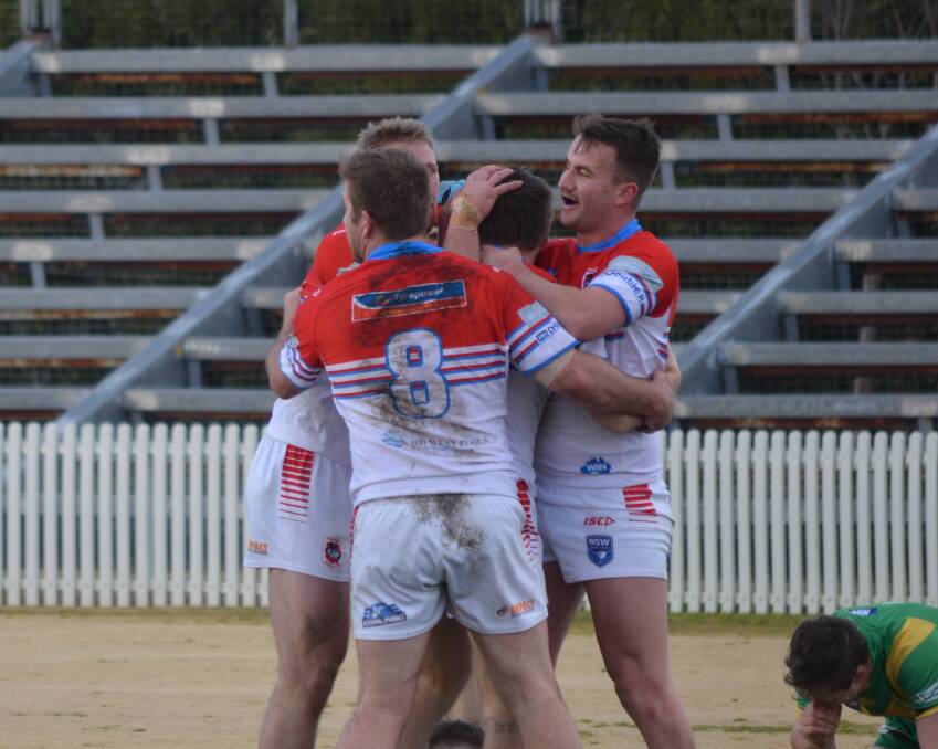 The Mudgee Dragons celebrate a try from Nathan Orr (centre) in their game against Orange CYMS on August 7. Picture: Lachlan Harper